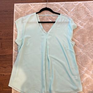 Light blue top